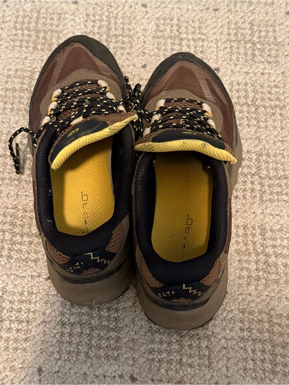 Merrell Kids Brown and Black Trail Running Shoes with Yellow Accents